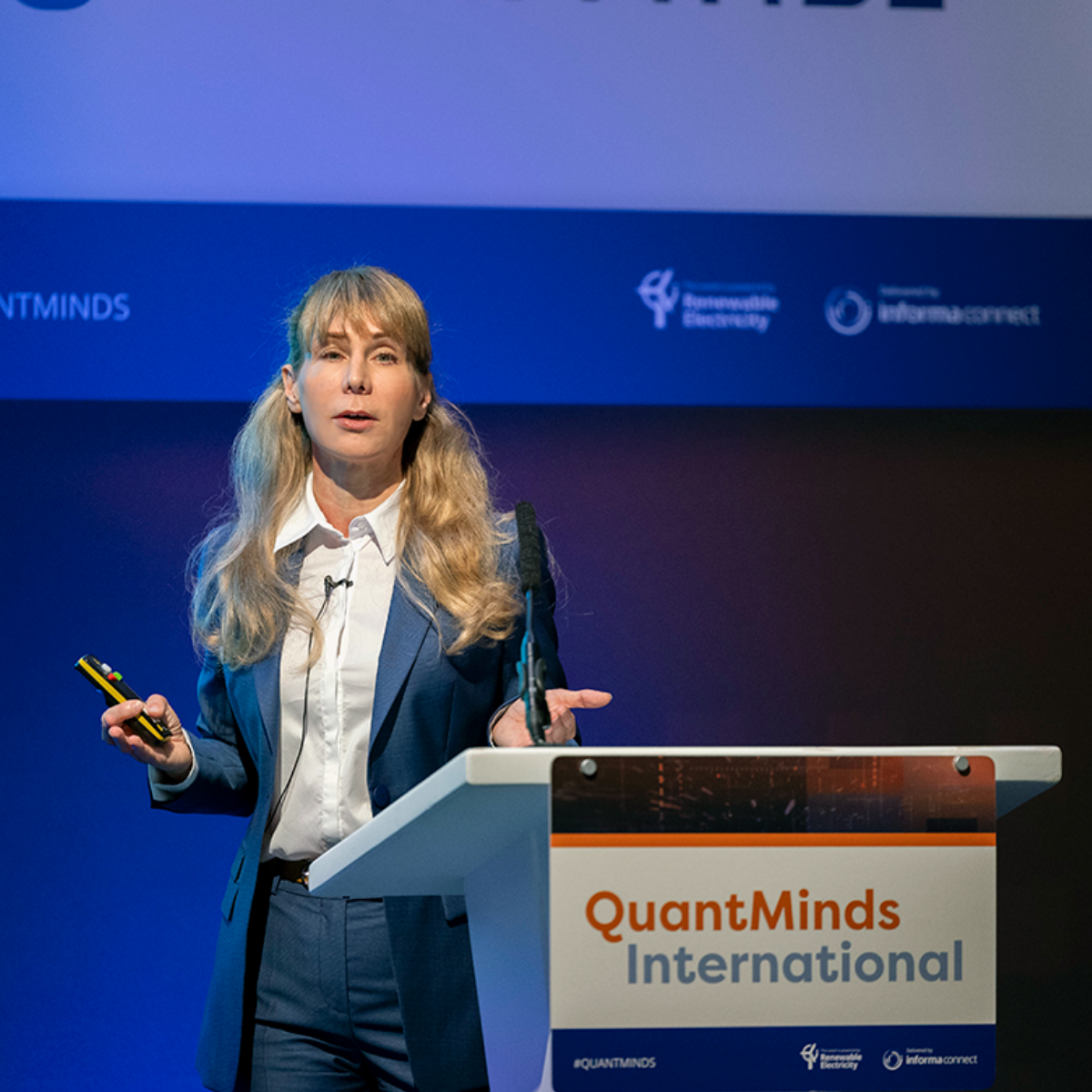 Nicole Königstein presenting at QuantMinds International